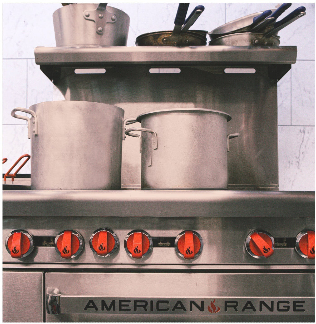 American Range - 48" Stainless Steel Restaurant Range 12" Griddles, 6 Burners, and 20" 2 Space Standard Oven - AR-12G-6B