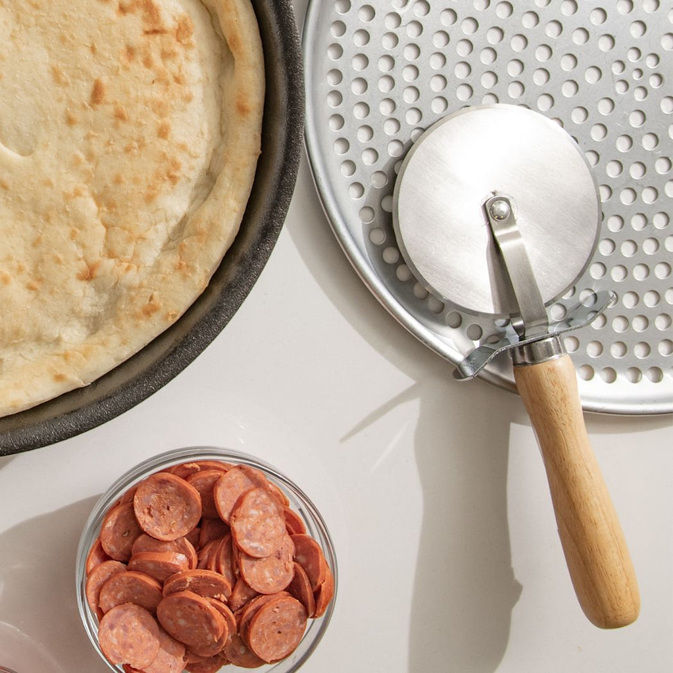 Browne - 4" Stainless Steel Pizza Cutter with Wood Handle - 574262