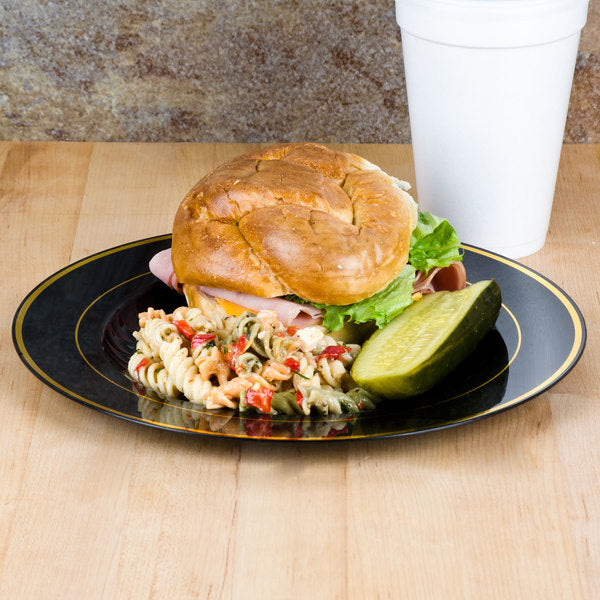 Fineline Settings - 10" Black/Gold Plastic Plate, 12/Pk, 10 Pk/Cs - 510-BKG