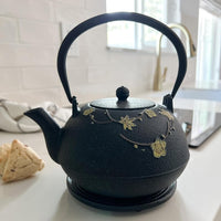 Ja By Frieling - Hama 34 fl. oz. Black/Yellow Cast Iron Teapot & Cast Iron Trivet with Stainless Steel Infuser - J25619