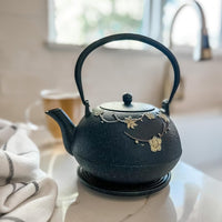 Ja By Frieling - Hama 34 fl. oz. Black/Yellow Cast Iron Teapot & Cast Iron Trivet with Stainless Steel Infuser - J25619