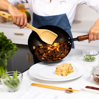 Joyce Chen - Classic Series 9.5" Black Carbon Steel Preseasoned Stir Fry Pan - J21-0509