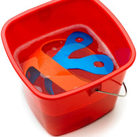 Mercer - Board Buddyz™ 15" x 20" - 18" x 30" Orange Silicone Holder for Cutting Board - M18930