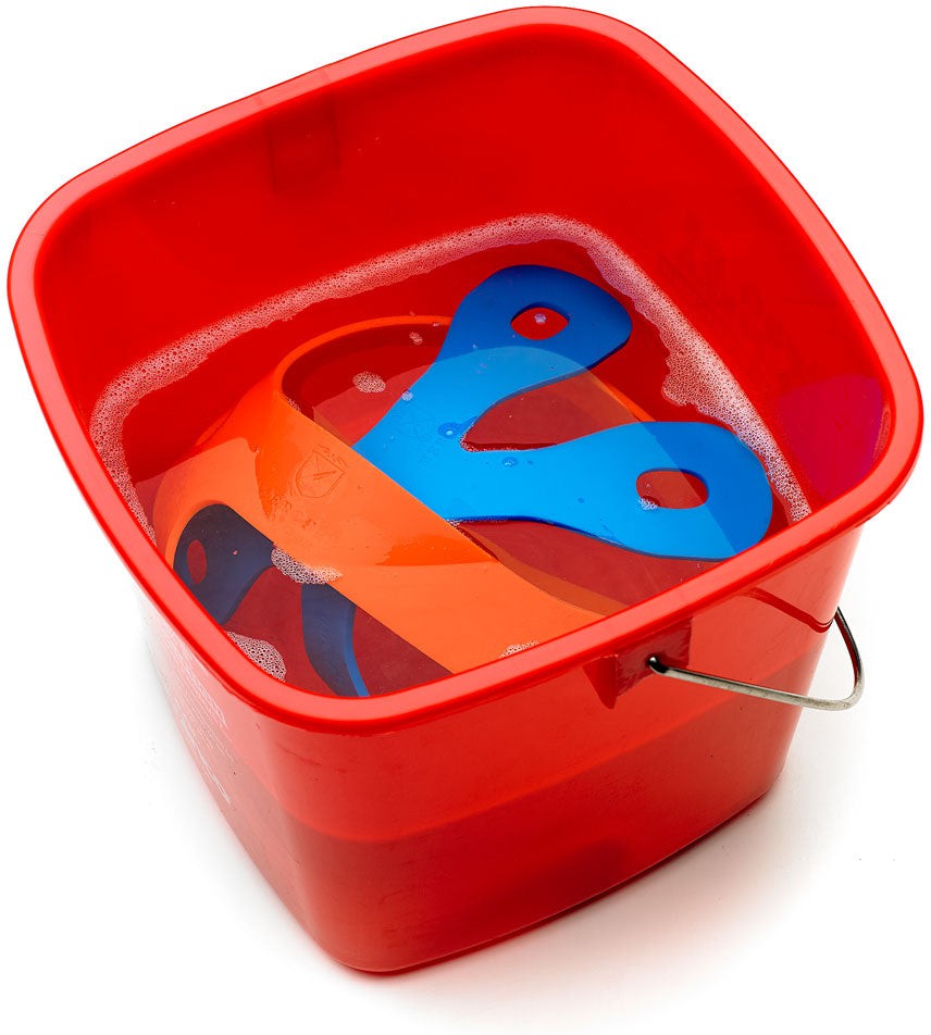 Mercer - Board Buddyz™ 15" x 20" - 18" x 30" Orange Silicone Holder for Cutting Board - M18930