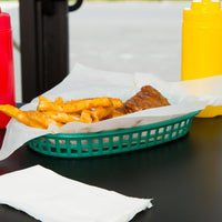 Omcan - 10" x 7" Green Plastic Oval Platter, Pack of 200 - 80354