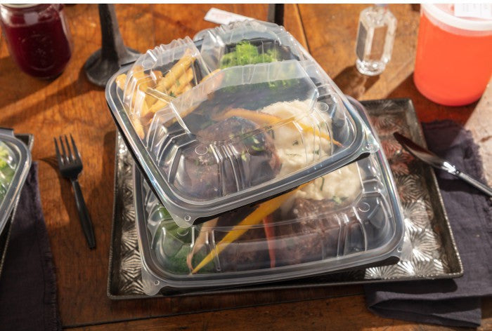 Pactiv Evergreen - 10.5 x 9.5 x 3.1" Black/Clear Vented Dual Color 3-Compartment PP Hinged Lid Container with 3-Compartment Lid, 132 Count - DC109330B00