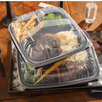 Pactiv Evergreen - 10.5 x 9.5 x 3.1" Black/Clear Vented Dual Color 3-Compartment PP Hinged Lid Container with 3-Compartment Lid, 132 Count - DC109330B00