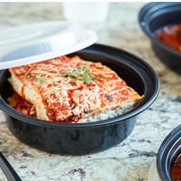 Pactiv Evergreen - VERSAtainer 48 oz. Black/Clear Round PP Container and Lid, Pack of 150 - NC948B