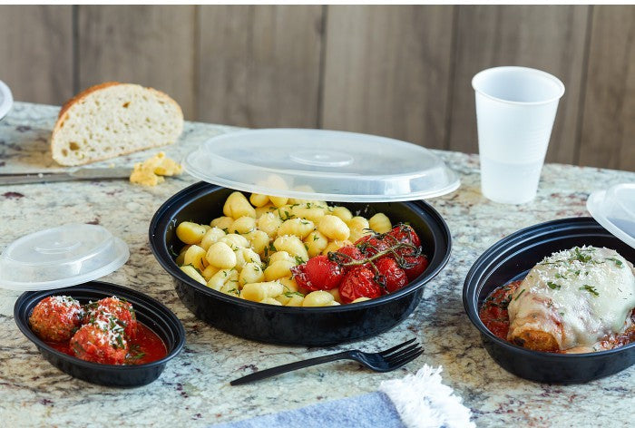 Pactiv Evergreen - VERSAtainer Oval 24 Oz Black Base with Clear Dome Microwavable Takeout Container And Lid Combo, Pack of 150 - OC24B