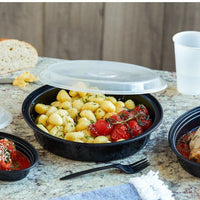 Pactiv Evergreen - VERSAtainer Oval 24 Oz Black Base with Clear Dome Microwavable Takeout Container And Lid Combo, Pack of 150 - OC24B