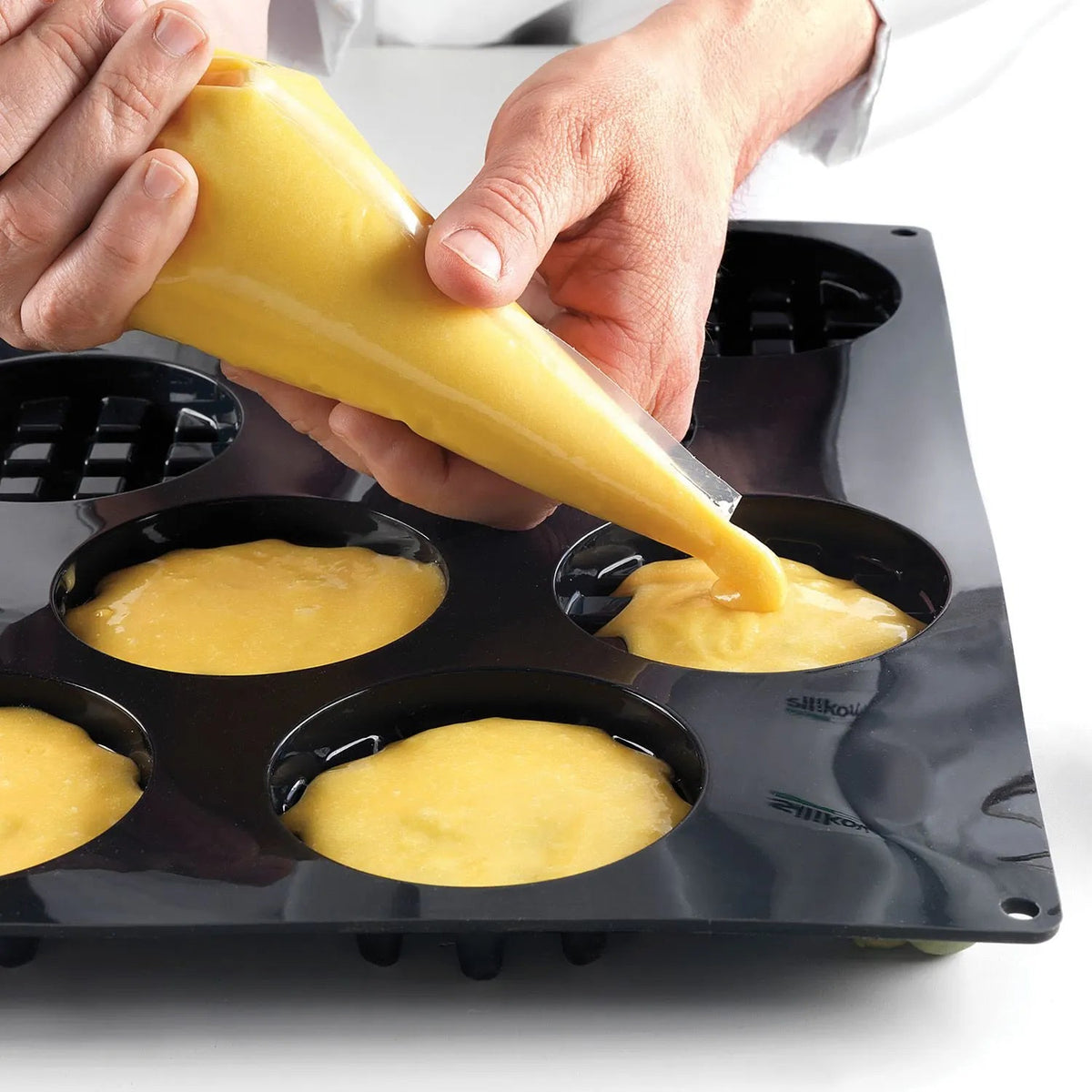 Silikomart - 1.8" x 1.2" x 0.57" Silicone Black 78 Compartment Mid Madeleine Baking Mold - SQ030