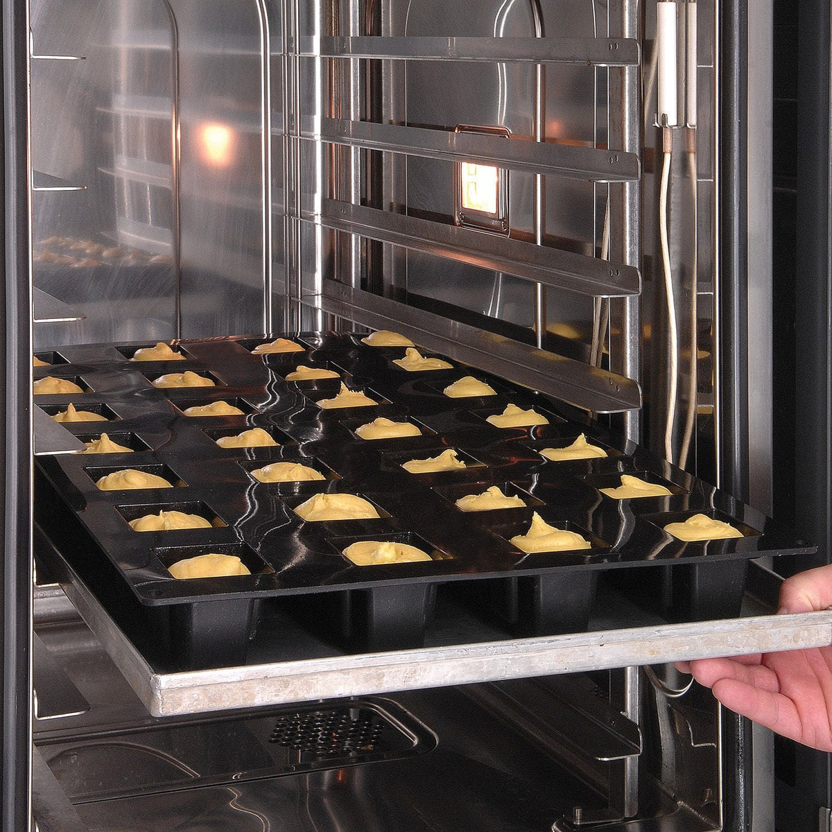 Silikomart - 2.8" x 2.8" x 2.3" Silicone Black 24 Compartment Pyramids Baking Mold - SQ057