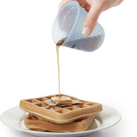 OXO - 4 oz Mini Squeeze & Pour Silicone Measuring Cup - 11161200G